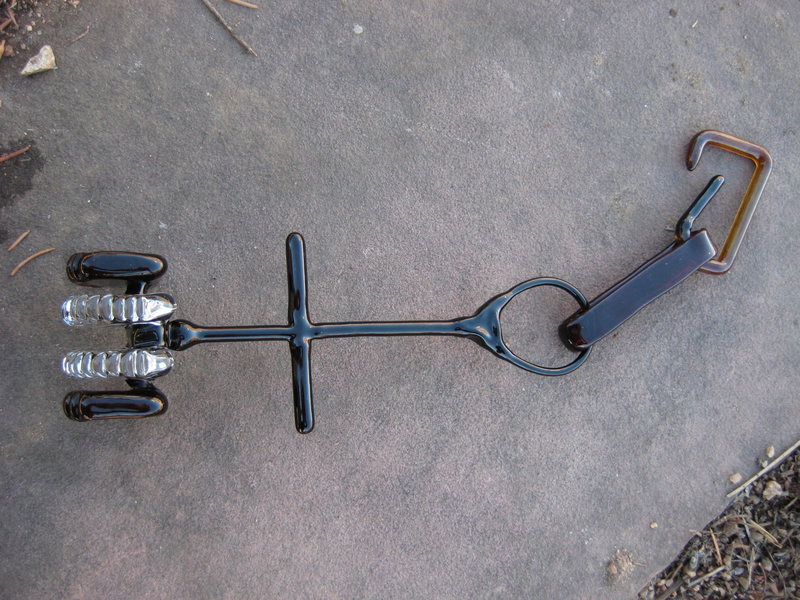 Glass Camalot #1, a little larger than scale. Complete with sling and racking biner.