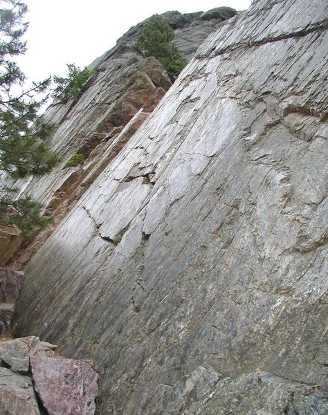 Faulted surface. Supremacy Rock. El Dorado Canyon, CO. Coal Creek Quartzite. Another nearby faulted climbing surface is Red Slab, in Clear Creek Canyon, Golden, CO.<br>
The polished surface is the result of 2 blocks of rock moving across each other.