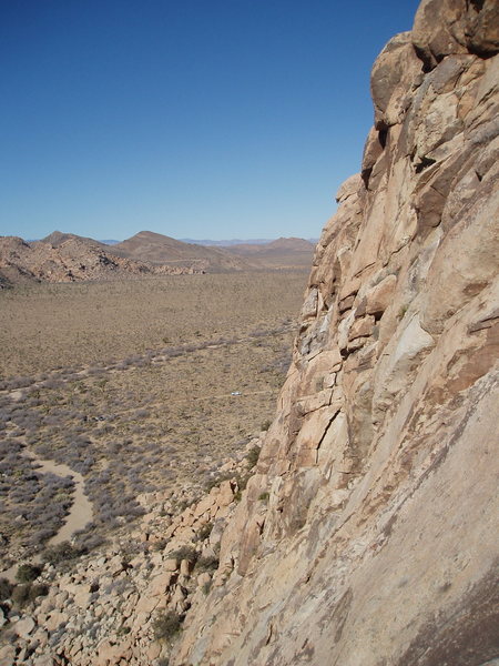 Looking climbers left along Lost Horse Wall. Pitch 1 belay station of The Roan Way