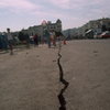 Crack in San Francisco street after Loma Prieta Earthquake.  This apparent "climbing opportunity" was filled in by the streets department.
