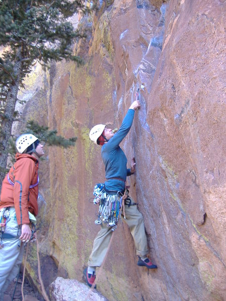 Trying to get a piece on the direct (5.10) start to the Yellow Spur. A brown (or pink?) tri-cam is key here in what appears to be a flaring pin-scar. Otherwise, be tall and fish in a tiny stopper (I had to have my partner place it as I was without said tri-cam).