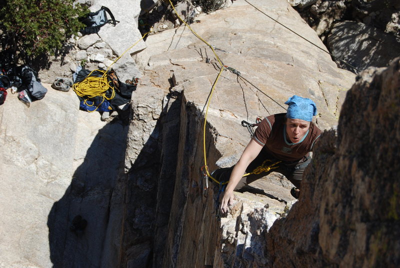 Sophie working hard for the redpoint on Steve's Arete. Jan 09.