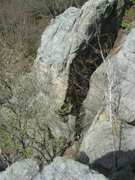 I took these shots of SAM in early 08 to study the route before trying it. Recently found them again and maybe they would help someone work/send. Taken from the top looking down on the route. You can see rapping should be no problem. You get a lot of rope drag trying to pull your rope after rapping though and might want to have your belay slave stay up top to toss the rope when you're done hanging the draws and down. Pic 3 of 4.