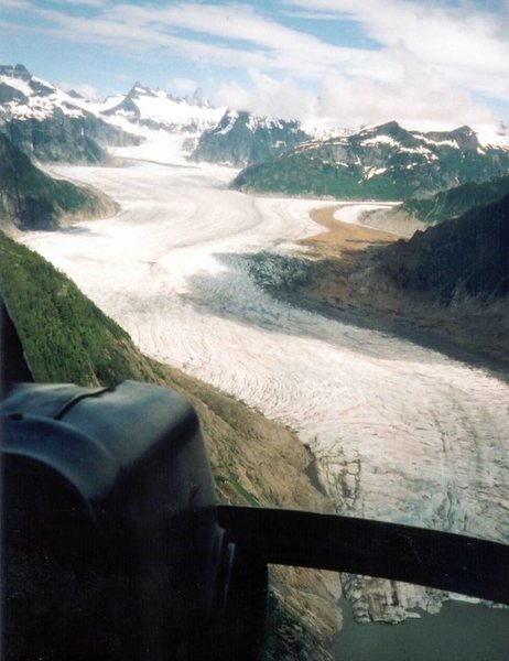 Flying over Thomas Bay, approaching the Patterson Glacier. The Thumb is visible on the horizon.