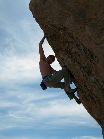 James on the steep prow of Psyche (V4), Joshua Tree NP