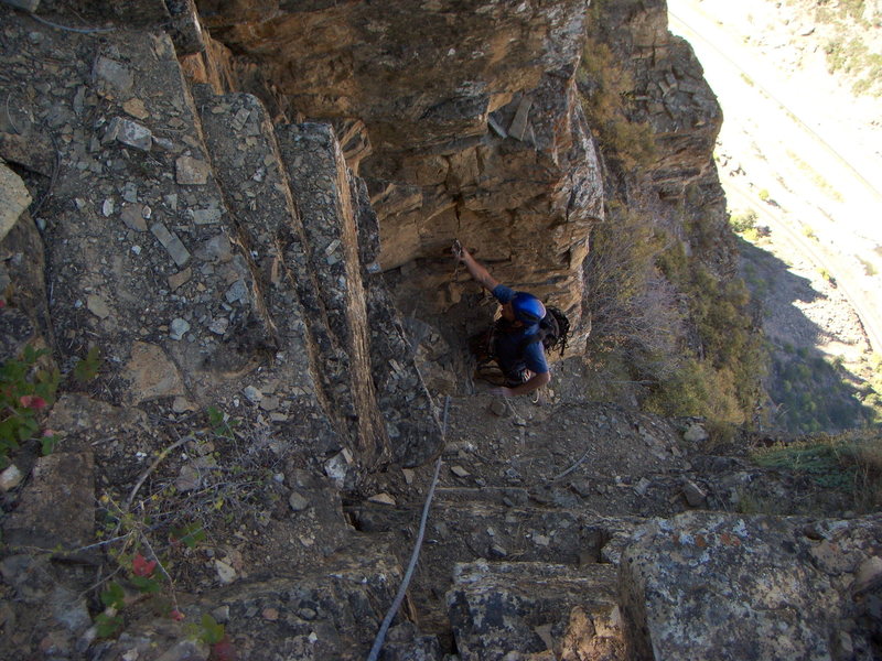 Climbing the final chimney pitch of The International, Glenwood Canyon.