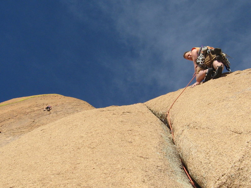 Stu exiting the crux crack on pitch 4 while Jeff leads pitch 5