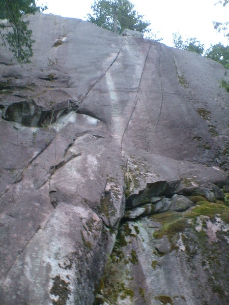 Wayback Layback is the left hand crack with the overlap at the base.