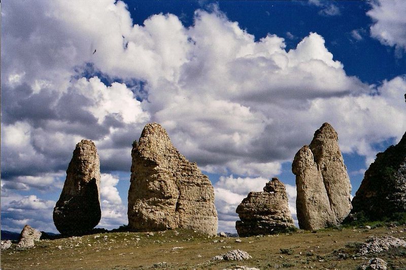 The Coyote Rocks from a distance. The Trickster and the Stout Wanker are in profile.