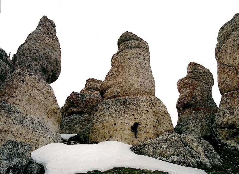 The main cluster of spires from the open hillside below them. From left to right: The Dirty Hippie, David's Member, The Paterfamilias, and Eddie's Bulging Belly (only part of it in pic).