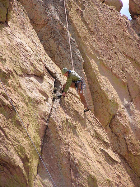 Rapping off of a route on Sheeps Head. The wind blew the rope EVERYWHERE and it caught in the chicken heads like a cat's cradle...