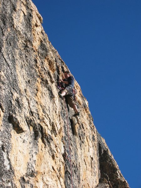 Working my way up a sweet 5.9 crack at Church Dome, CA