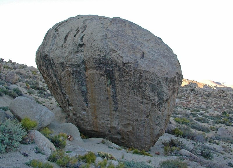 South face of the 'Beekeeper Boulder'. Left arete is 'Golden Shower', v10. Right arete is 'Mesothelioma', v7