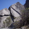 View of Middle Sunset Wall - Old Rag Mountain.  Prominent left-leaning line is "Mosaic" 5.10b. 