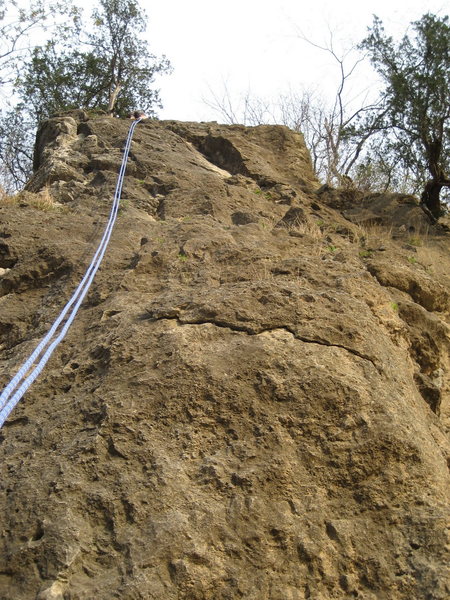Kippered Devi 5.7 - To the left are plentiful pockets in the first half that sometimes get pretty dirty. Staying more centered increases the difficulty as you approach the flake that is about 1/3 of the way up. Off to the left 2/3 of the way up is a fun crack directly below the cedar to practice a few jams.