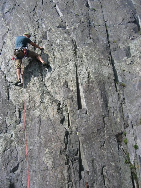 Enjoying perfect incuts and edges on Welsh slate. Lamberis, Wales, UK.