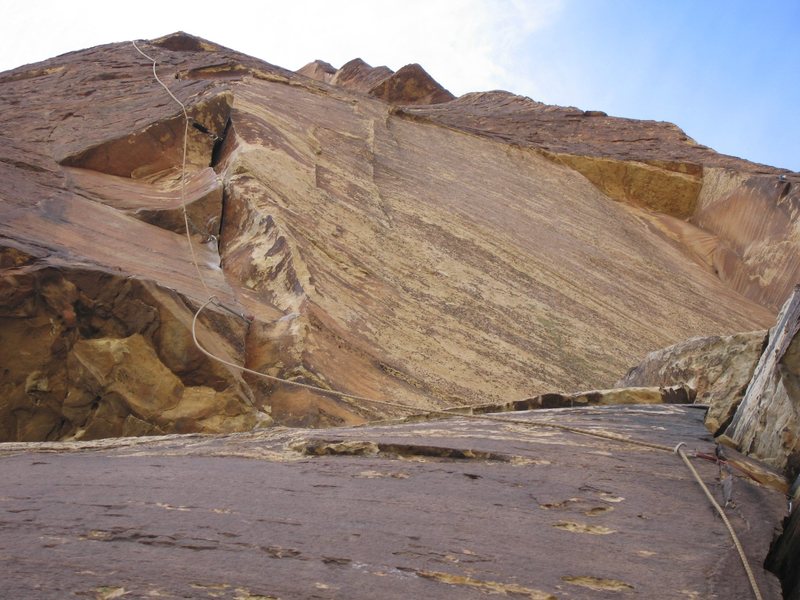 Looking up at the crux roof on p2 of Triassic Sands, having linked p1 and p2.