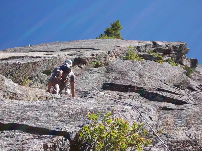 Espinosa nearing the two bolts on the route, and the crux. West Buttress 5.8