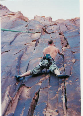 Proving once again there's no such thing as a good top rope picture. And, yes, hecklers, I DID lead this 10c on Wall Street, Pot Ash road, Moab, UT. I just didn't trust my bone-headed belayer to take this shot on lead.