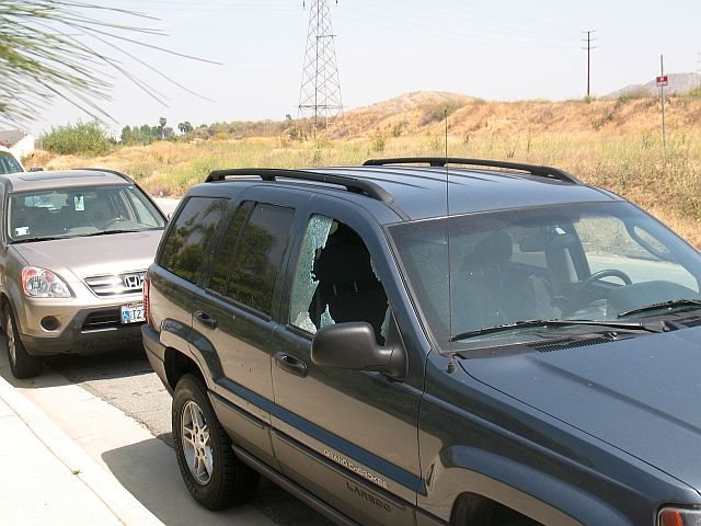 One of two vehicles broken into on 5/03/09. A visual reminder to not leave valuables in your vehicle.