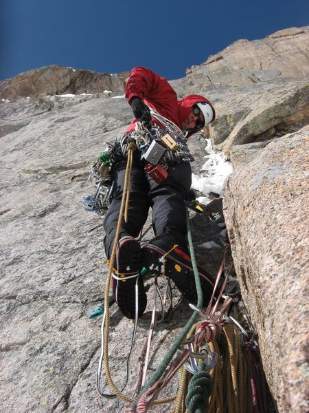 Chris Sheridan leading up the second pitch of Shining Slab on 5-10-09. We tried to link this climb to D7 but were turned around on the third pitch by steep featureless slabs covered in loose snow. The roof of The Grey Pillar can be seen in the upper left, while The Diamond can be seen high above to the upper right.