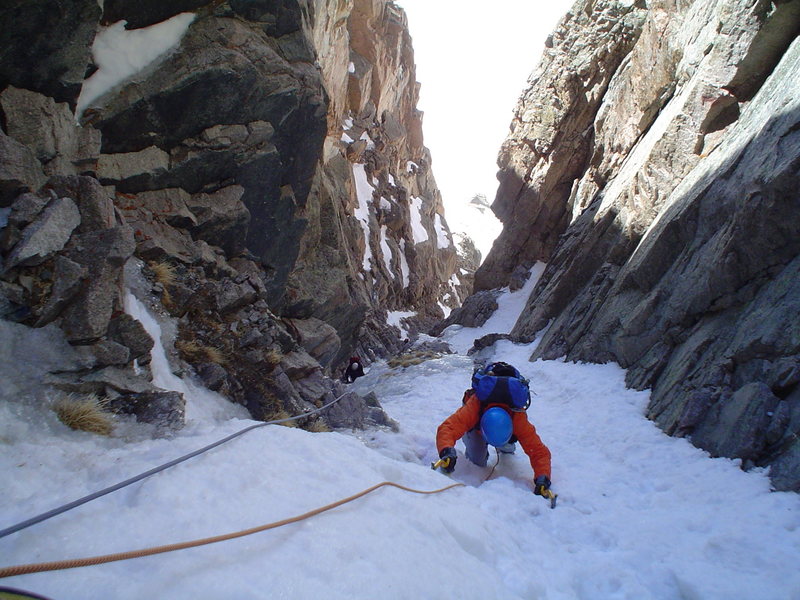 Brenta arriving near my belay atop P1. I stretched it out a full 60m and belayed right at the last vertical-ish ice constriction. 5/17/09.