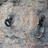 The old belay/rappel anchor for The Long Haul at the Puoux, Glenwood Canyon.