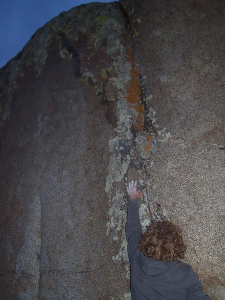 It's highball, and this photo doesn't quite do it justice. Grey Lightning goes up that grey dike there, and the crack problem (Electric Attraction) heads right.