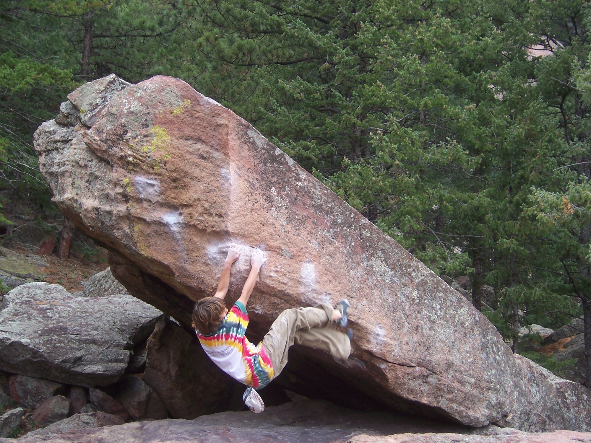 Bouldering on the BBC capstone of the Satellite Boulders, see