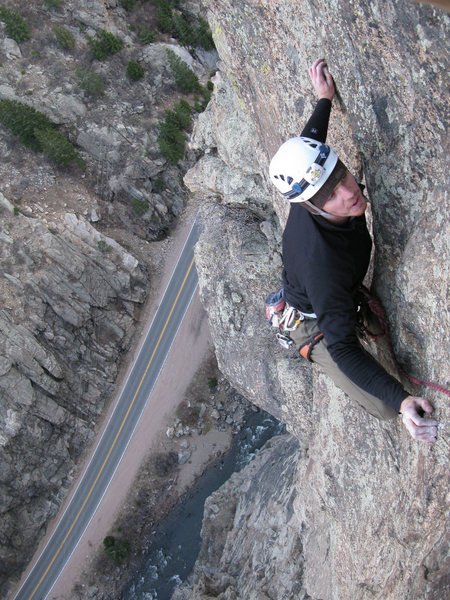 The exposed slab moves above the crux of the final pitch. Note the headlamp, gotta love after work multi-pitch.