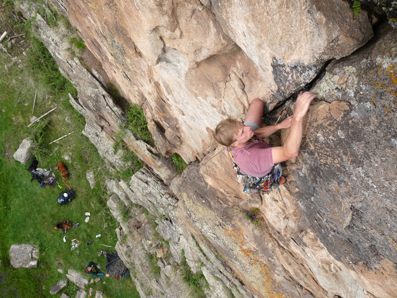 Bill below the roof after placing the confidence inspiring #4 camalot.