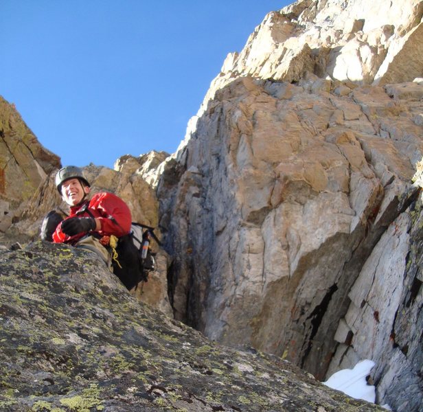 Erik smiling and having fun on the route. Just below the P3 crux cleft.
