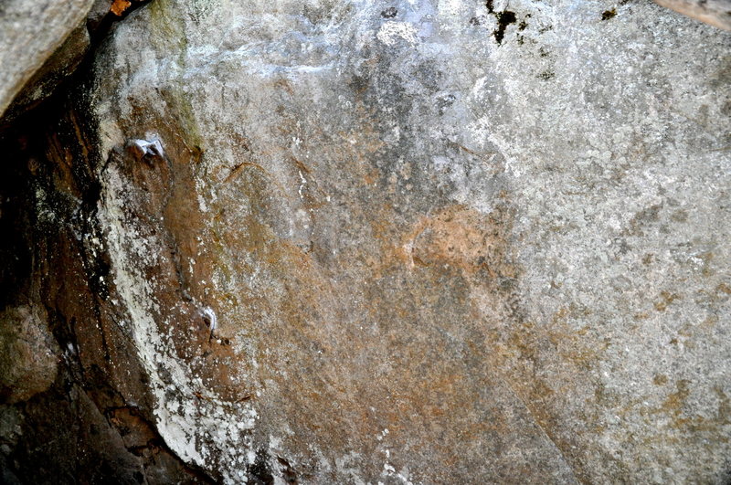 Vag Badger sit starts of the left side in the cave & traverses right to a jug. Flat, angular holds. Rock is very different from Poppy Cock adjacent to it.