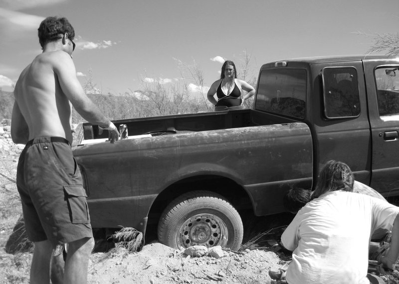 Are you stranded in the hot, brutal desert, dehydrated, and exhausted with no cell coverage, out of water, and with three toddlers? Not to worry, the Desert Rats Jonny, and Gigi, pros in stuck truck removal ; ) are here to save the day. <br>
<br>
(Jonny on left)<br>
<br>
Taken 6/2/09 in Arizona<br>
<br>
<br>
<br>