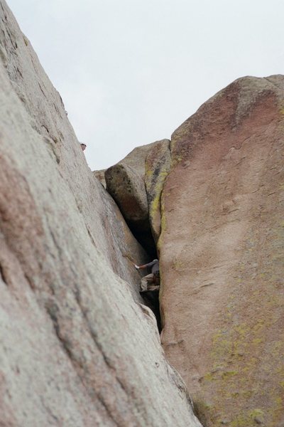 Moving through the chimney on Satterfield's Crack.