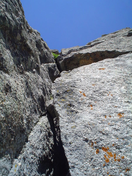 Foreshortened view of P2 & P3 on the CMC Route. Aim for the notch in the rock on the skyline.