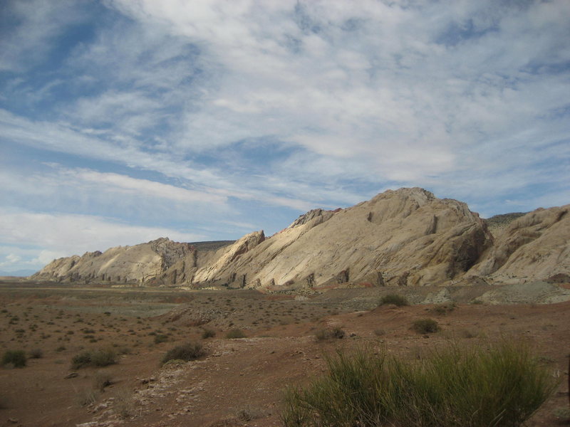 Looking down the southern end of the slabs ."Surfing the Swell" slab (over 1600') formation is in the foreground.The dark Canyon wall on the right forms Bongo canyon. Two fine climbs start out of this canyon ..Silver Lining 5.12 and Feeding the Rat 5.9-