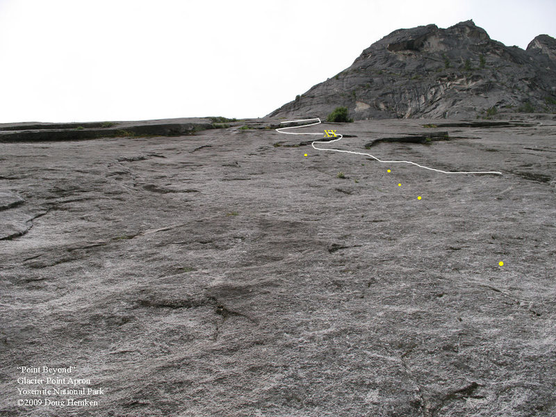 Looking up "Point Beyond." Some of the bolts on the first pitch are marked in yellow.