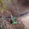 April Wright egotistically avoiding the perfect hand jams as she cruises the crux of the route.