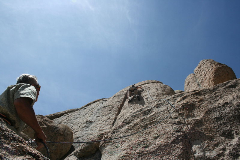 Noelle on the upper wall of a 5.10 don't know the name of with Derek on belay.<br>