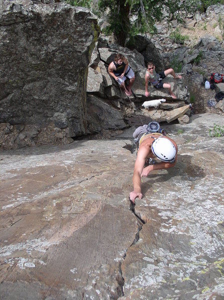Center crack runnin' it out. The route seems more fun if one goes left at the bulge, the hand size crack in the bulge can take good gear.