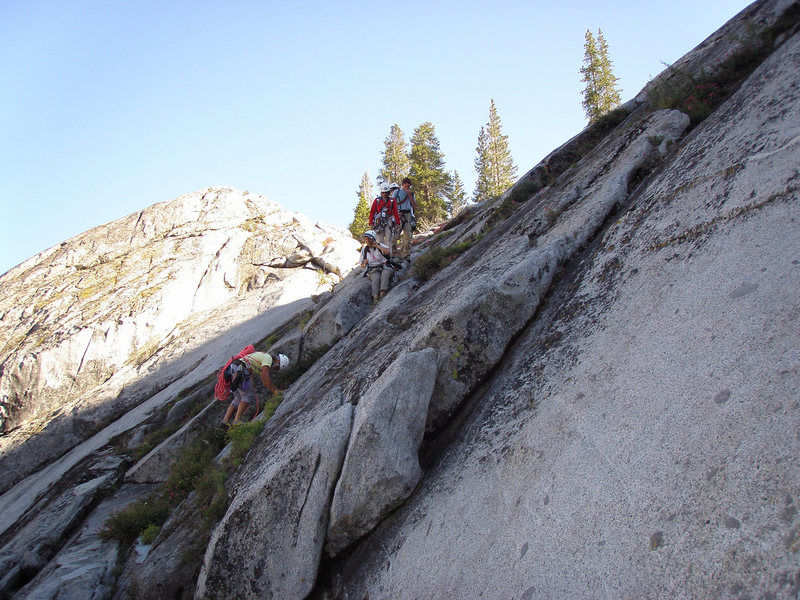 The best way to approach is to rap in to the climb. Start from the geological area parking lot and walk about 5 minutes to the right. Drop down the obvious "gash" and do a bit of down climbing. We did it in sneakers.