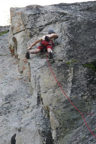 Chalking up prior to the crux on Edge of Freedom.