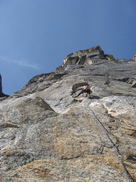 Looking up pitch 1 of the route. Just above the climber is where you traverse left onto the difficult to protect section.