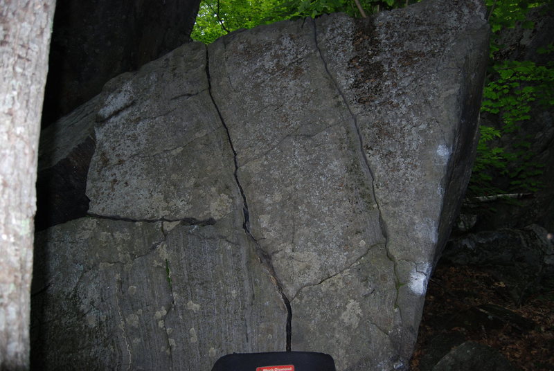 These cracks make up The Long Trail (V0)<br>
<br>
PBR (V4) climbs the right arete and the hidden face around right of the arete