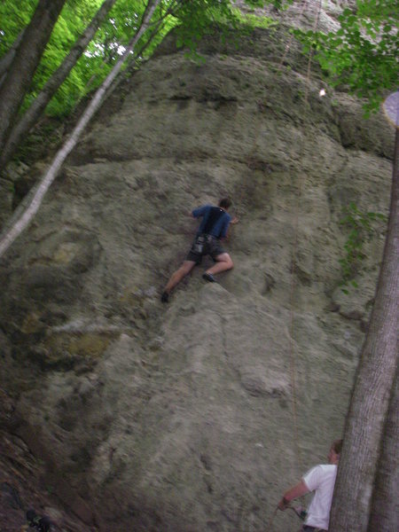 Nick on TR.  First bolt is high.  If Nick was leading, he'd about in clipping stance.  Easy climbing but spotter could be useful.