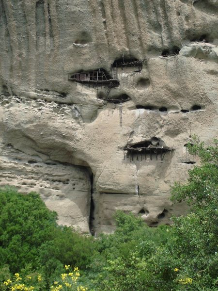 Monk cells on Pixari. If you get nervous on your portaledge, imagine spending months at a time living on these makeshift wooden structures.