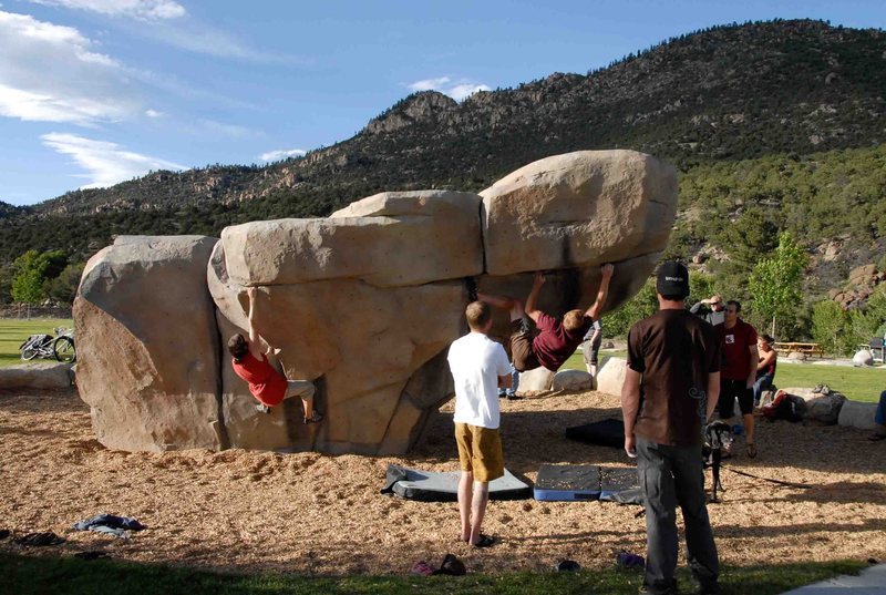 The southwest aspect facing the Brewpub. Gal in the red shirt is climbing the "texas flake"