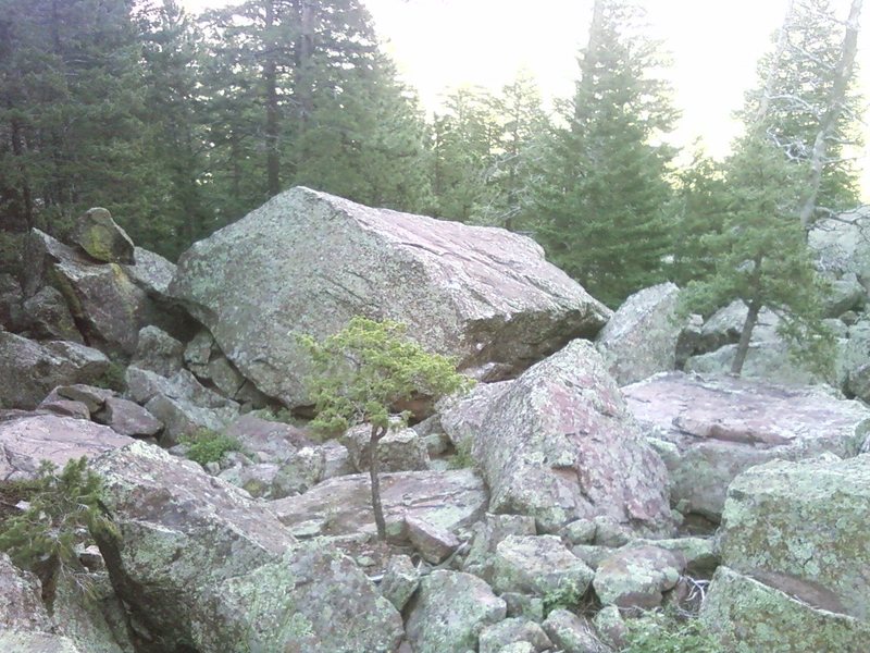 "Bloc Party" climbs the overhanging right face of this boulder.