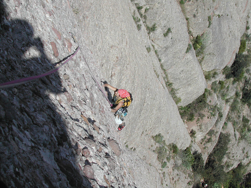 Classical "Easy rider" route. 6a- In this shot, Thaïs in the second pitch (V+) of seven pitches. It goes app in the middle of the anterior photo